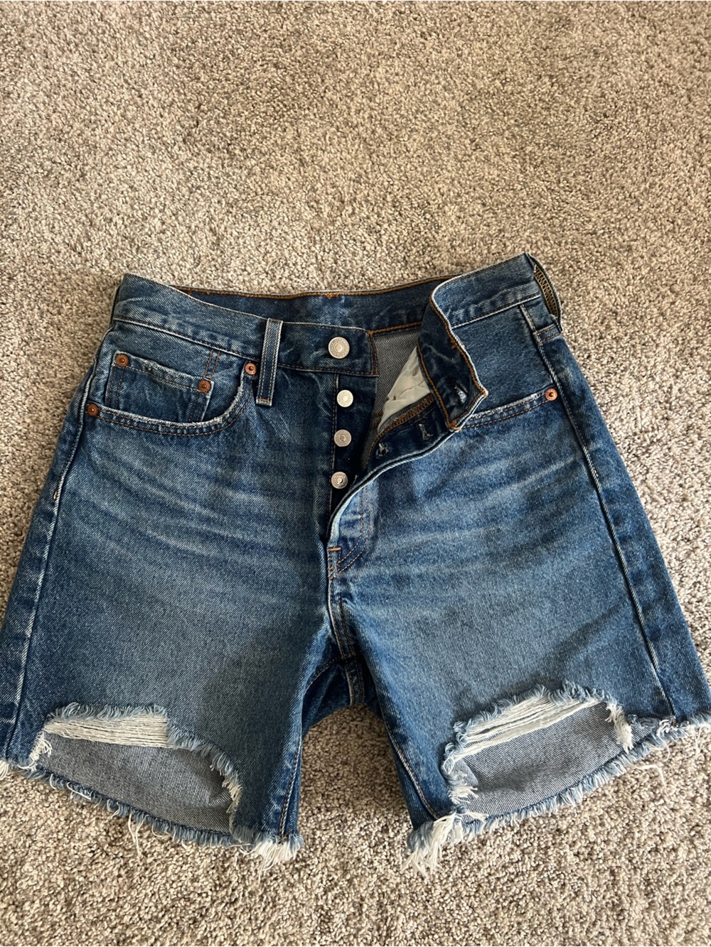 Levi's Distressed Dark Blue Cropped Button-Fly shorts
